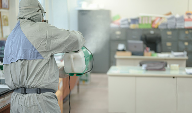 disinfecting office prevent covid 19 person white hazmat suit with disinfect office coronavirus concept 43525 1576