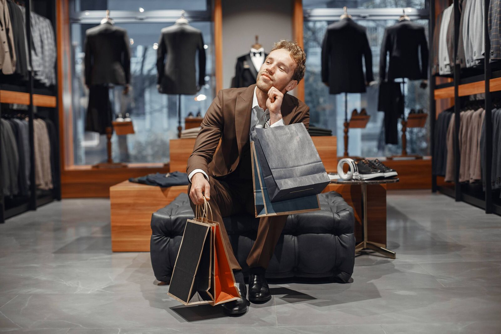 sale shopping fashion style people concept elegant young man choosing footwear mall 1
